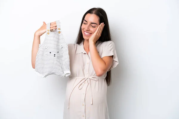 Mujer Joven Caucásica Aislada Sobre Fondo Blanco Embarazada Sosteniendo Ropa — Foto de Stock