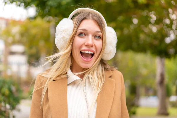Young Pretty Blonde Woman Wearing Winter Muffs Outdoors Surprise Facial — Stock Photo, Image