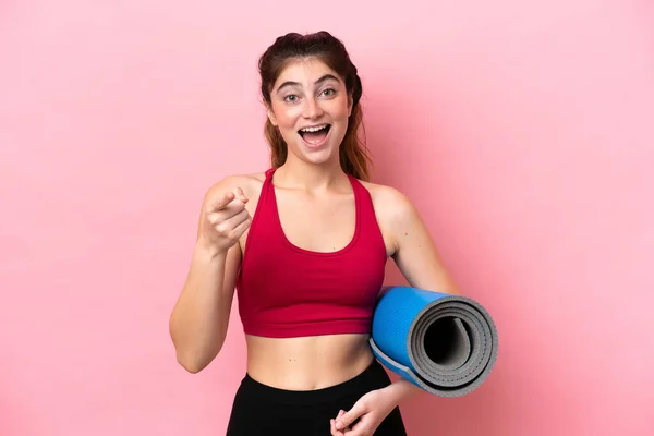 Young Sport Woman Going Yoga Classes While Holding Mat Surprised — Foto Stock