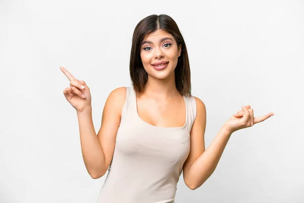 Young Russian Woman Isolated White Background Pointing Finger Laterals Happy — Φωτογραφία Αρχείου
