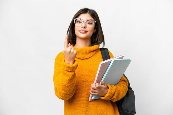 Young student woman over isolated white background doing coming gesture