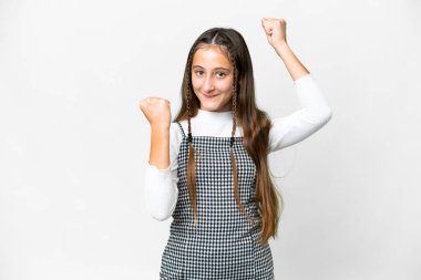 Young girl over isolated white background celebrating a victory