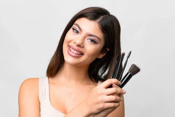 Young Russian Woman Isolated White Background Holding Makeup Brush Whit — Stock Photo, Image