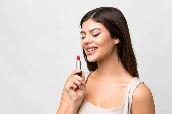 Young Russian Woman Isolated White Background Holding Red Lipstick — Foto Stock