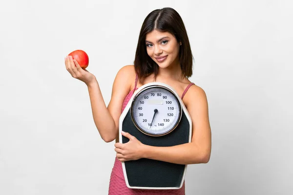 Young Russian Woman Isolated White Background Weighing Machine Apple — Foto Stock