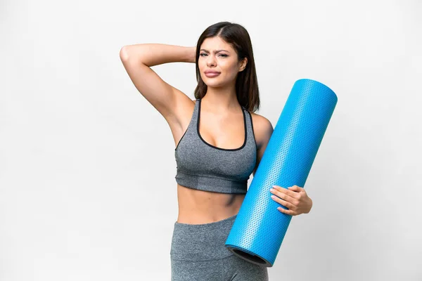 Young Sport Woman Going Yoga Classes While Holding Mat Isolated — Stock fotografie