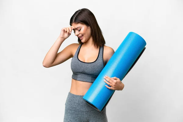 Young Sport Woman Going Yoga Classes While Holding Mat Isolated — Stockfoto