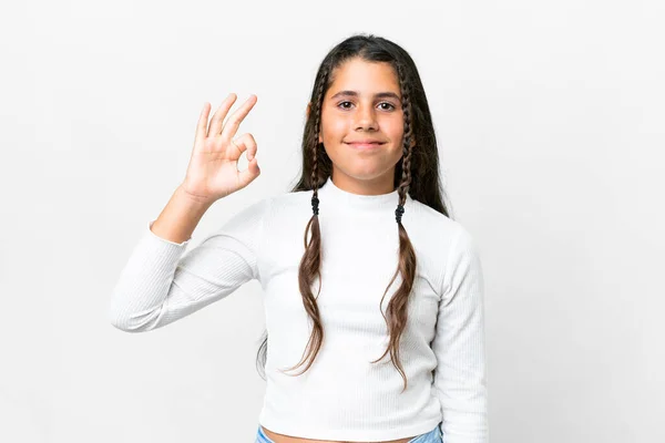 年轻姑娘在孤独的白色背景上用手指显示出好的体征 — 图库照片