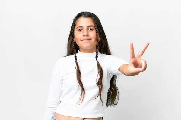 Chica Joven Sobre Fondo Blanco Aislado Sonriendo Mostrando Signo Victoria —  Fotos de Stock