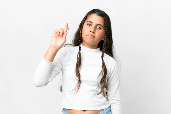 Νεαρό Κορίτσι Πάνω Από Απομονωμένο Λευκό Φόντο Δάχτυλα Σταυρώνουν Και — Φωτογραφία Αρχείου