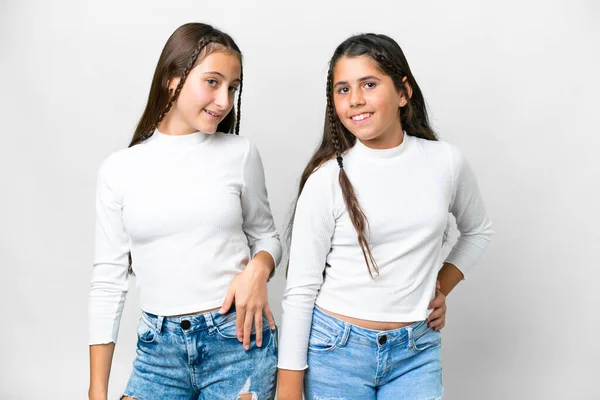 Vrienden Meisjes Geïsoleerde Witte Achtergrond Poseren Met Armen Heup Glimlachen — Stockfoto