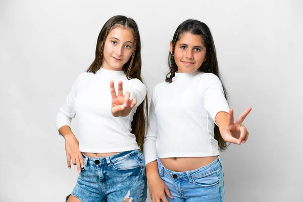 Friends Girls Isolated White Background Smiling Showing Victory Sign — Zdjęcie stockowe