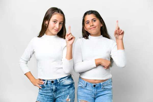 Przyjaciele Dziewczyny Odizolowanym Białym Tle Pokazując Podnosząc Palec Znak Najlepszych — Zdjęcie stockowe