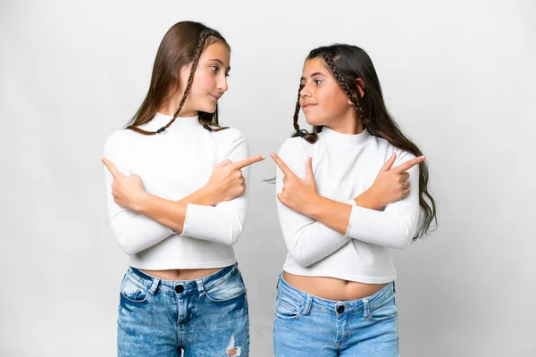 Friends Girls Isolated White Background Pointing Laterals Having Doubts — Stock Photo, Image
