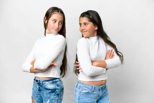 Amigos Chicas Sobre Fondo Blanco Aislado Mirando Por Encima Del —  Fotos de Stock