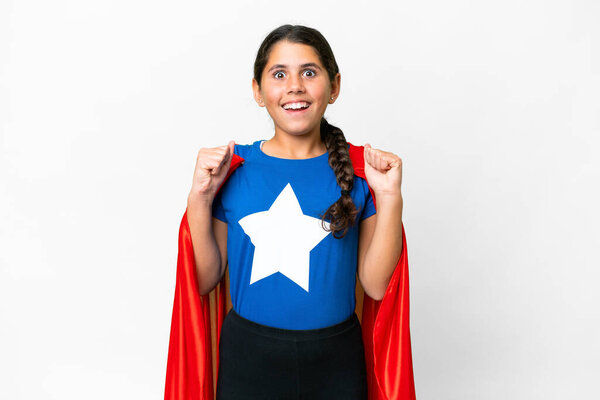 Super Hero girl over isolated white background celebrating a victory in winner position