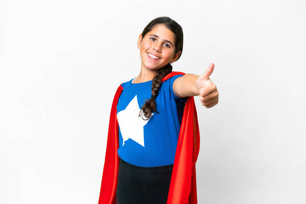 Super Hero girl over isolated white background with thumbs up because something good has happened