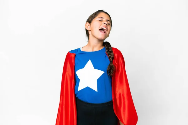 Super Hero girl over isolated white background laughing