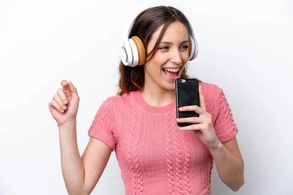 Junge Kaukasische Frau Isoliert Auf Weißem Hintergrund Musik Hören Mit — Stockfoto
