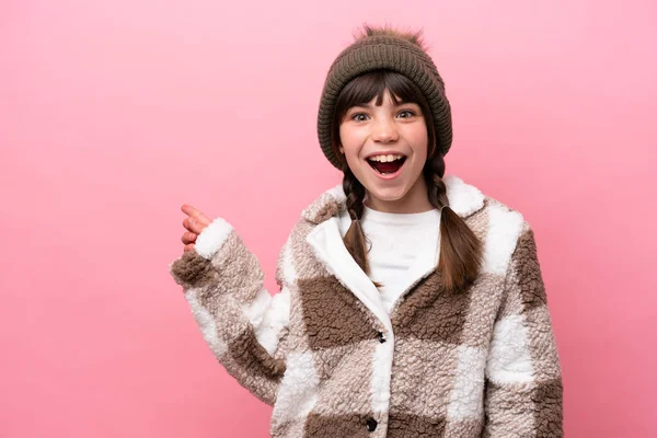Little Caucasian Girl Winter Jacket Isolated Pink Background Surprised Pointing — 스톡 사진