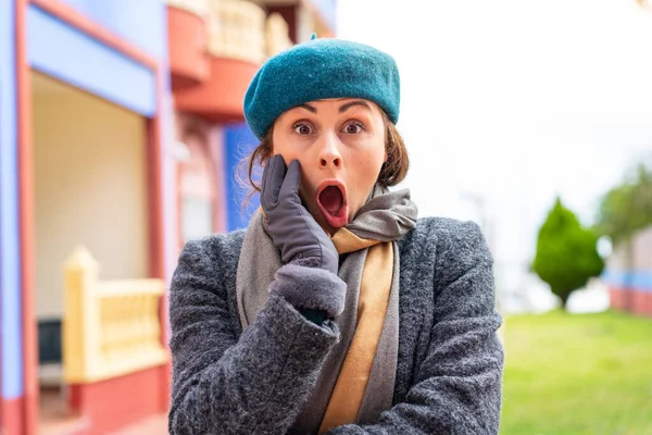 stock image Brunette woman at outdoors surprised and shocked while looking right