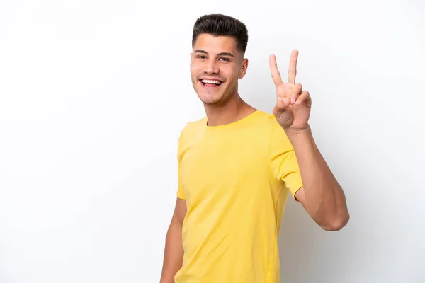 Junger Kaukasischer Mann Auf Weißem Hintergrund Isoliert Lächelt Und Zeigt — Stockfoto