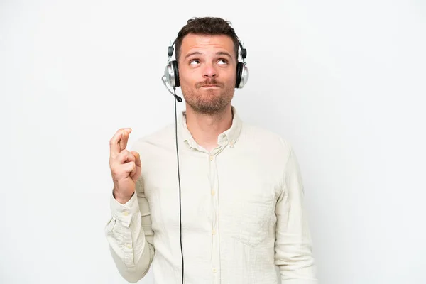 Telemarketer Caucasian Man Working Headset Isolated White Background Fingers Crossing — Stockfoto