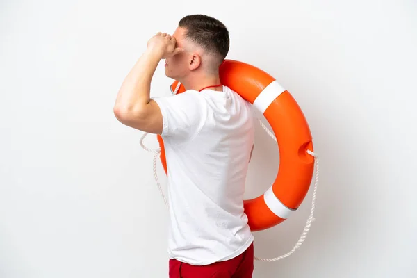 Young Brazilian Man Isolated White Background Lifeguard Equipment Showing Something —  Fotos de Stock