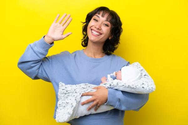 Jovem Mulher Argentina Com Seu Bebê Bonito Saudando Com Mão — Fotografia de Stock