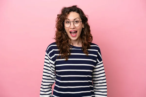 stock image Young caucasian woman isolated on pink background with surprise facial expression