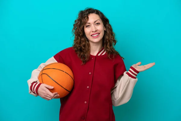 Young Caucasian Basketball Player Woman Isolated Blue Background Extending Hands — Stock Photo, Image