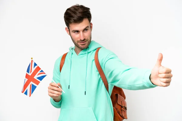 年轻的学生高举英国国旗 身披白色背景的高加索男子举起大拇指 — 图库照片