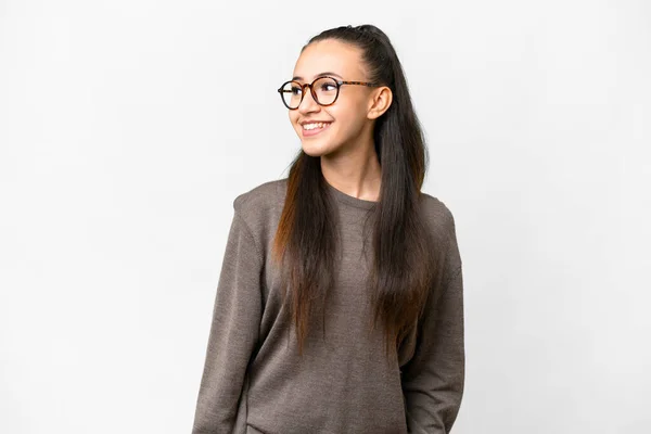 Stock image Young Arabian woman over isolated white background looking to the side and smiling