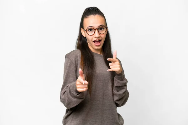 stock image Young Arabian woman over isolated white background pointing to the front and smiling