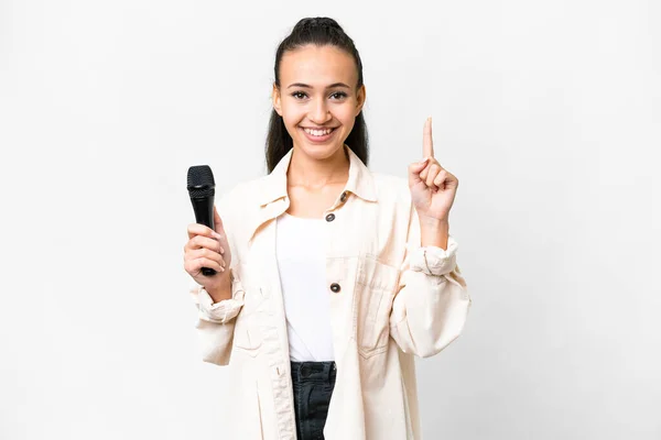 Genç Şarkıcı Kadın Izole Edilmiş Beyaz Arka Planda Mikrofonu Eline — Stok fotoğraf