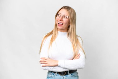 Young pretty blonde woman over isolated white background happy and smiling