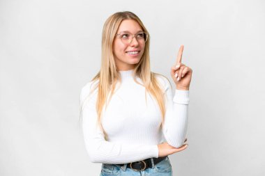 Young pretty blonde woman over isolated white background pointing up a great idea