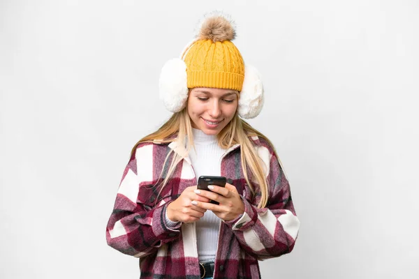Young Pretty Blonde Woman Wearing Winter Muffs Isolated White Background — Stock Fotó