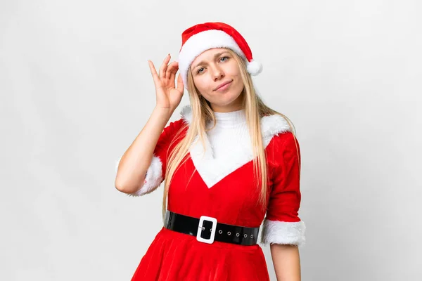 Junge Blonde Frau Mit Weihnachtsmütze Über Isoliertem Weißem Hintergrund Hat — Stockfoto