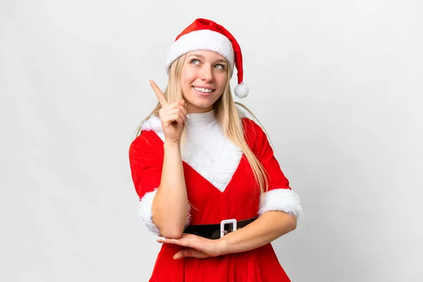 若いですブロンド女性とともにクリスマス帽子上の隔離されたホワイトバックグランドPointing A素晴らしいアイデア — ストック写真