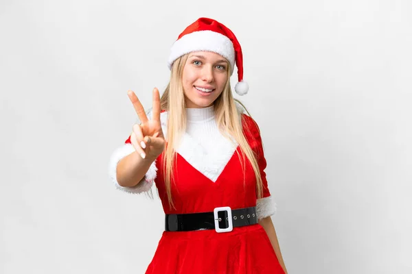 Jovem Loira Com Chapéu Natal Sobre Fundo Branco Isolado Sorrindo — Fotografia de Stock