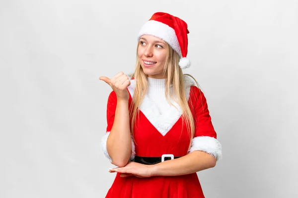 Young Blonde Woman Christmas Hat Isolated White Background Pointing Side — 图库照片