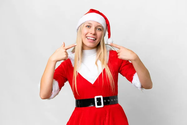 크리스마스 모자를 여자가 위에서 엄지손가락을 치켜들고 몸짓을 — 스톡 사진