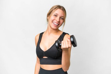 Blonde sport woman making weightlifting over isolated white background with happy expression