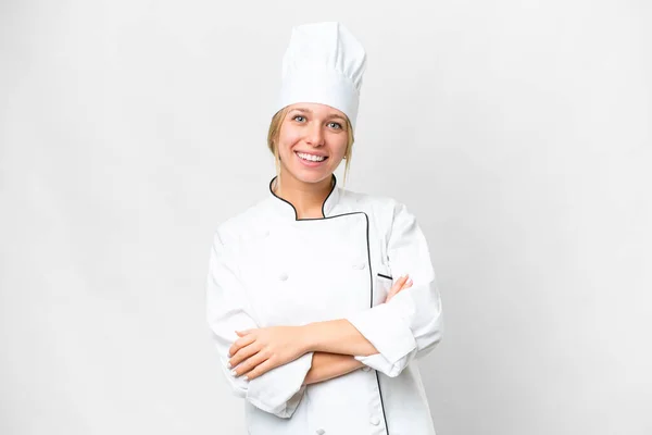 Jovem Chef Mulher Sobre Isolado Fundo Branco Mantendo Braços Cruzados — Fotografia de Stock