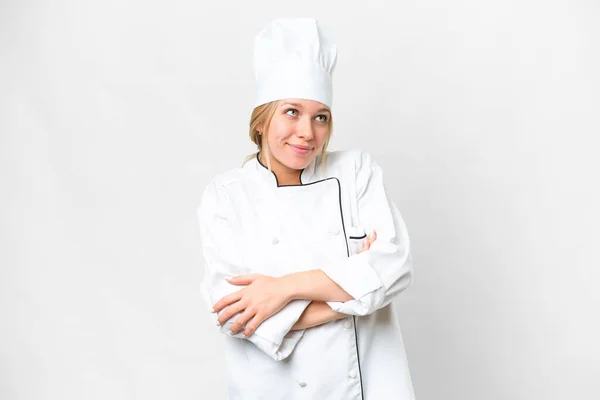 Jovem Chef Mulher Sobre Fundo Branco Isolado Fazendo Gestos Dúvidas — Fotografia de Stock