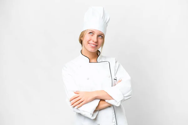 Jovem Chef Mulher Sobre Isolado Fundo Branco Olhando Para Cima — Fotografia de Stock