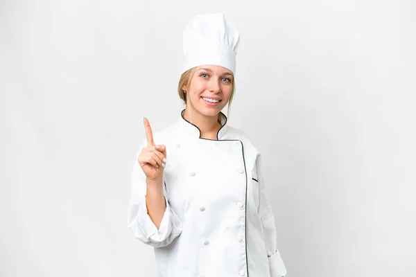 Joven Chef Mujer Sobre Aislado Fondo Blanco Mostrando Levantando Dedo —  Fotos de Stock