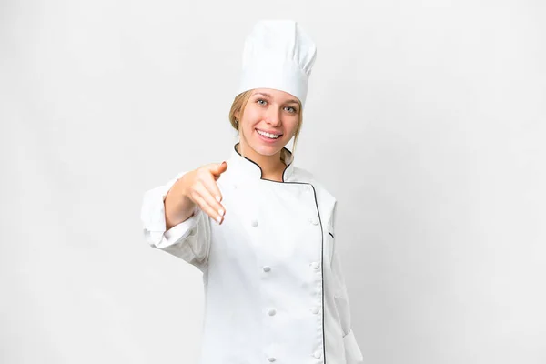 Joven Chef Mujer Sobre Aislado Fondo Blanco Estrechando Las Manos —  Fotos de Stock