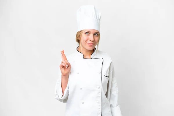 Jonge Chef Kok Vrouw Geïsoleerde Witte Achtergrond Met Vingers Kruisen — Stockfoto